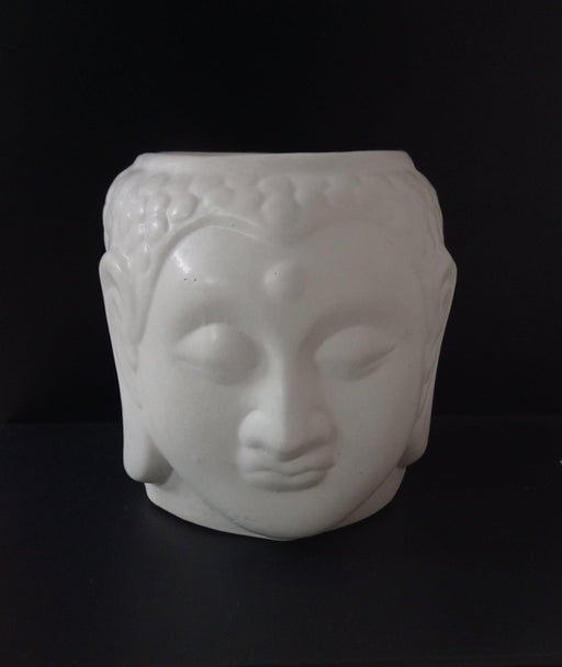 White ceramic Buddha face plant pot