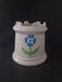 White ceramic plant pot with round Tulsi design
