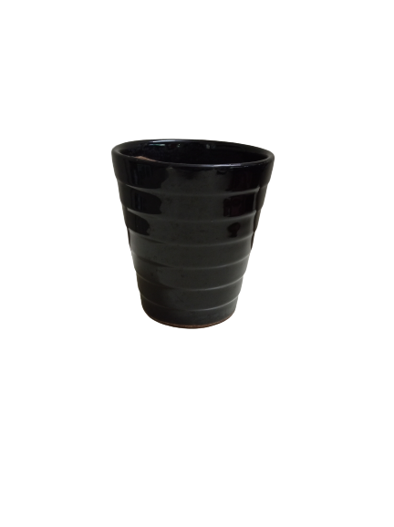 Sleek round plant pot with drainage hole