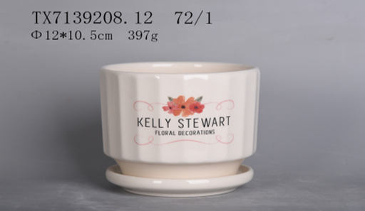 Cream color ceramic planter by KELLY STEWART
