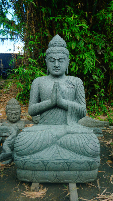 SEATED BUDDHA PRAYING