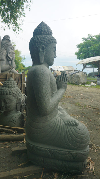SEATED BUDDHA PRAYING