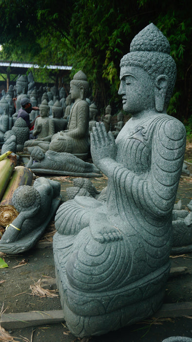 SEATED BUDDHA PRAYING