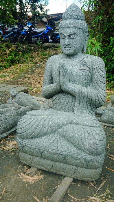 SEATED BUDDHA PRAYING