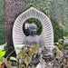 Handcrafted Buddha garden statue with decorative halo design