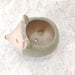 Decorative smiling hedgehog ceramic pot
