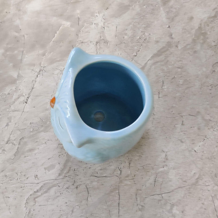 Decorative sleepy owl ceramic pot for tabletop and shelf display