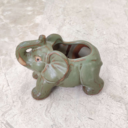 Decorative vintage green elephant ceramic planter