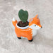 Charming fox ceramic planter for succulents and small indoor plants.
