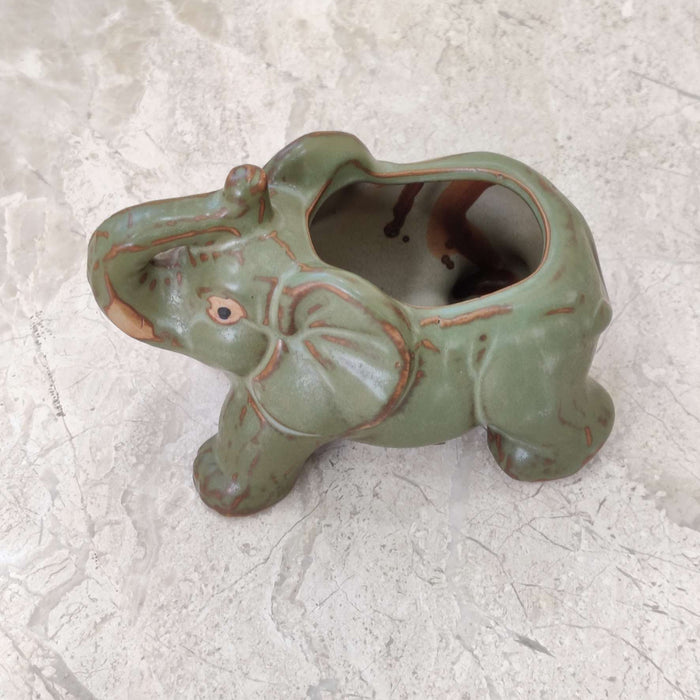 Vintage green elephant ceramic pot