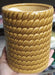 Cylindrical ceramic plant pot in yellowish brown