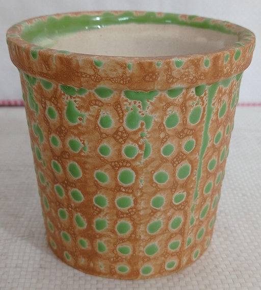 Fancy painted ceramic pot with glossy finish