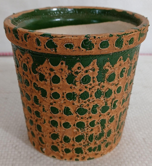 Fancy painted ceramic pot in turtle green with dotted design