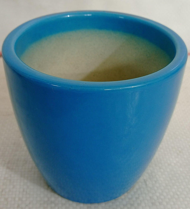 Small glossy ceramic pot