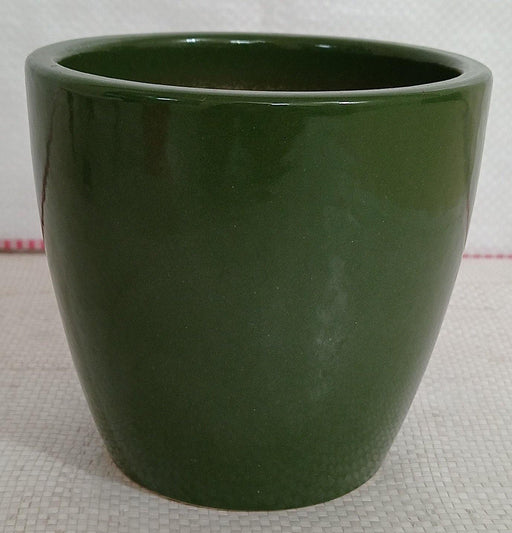 Ceramic pot in turtle green color