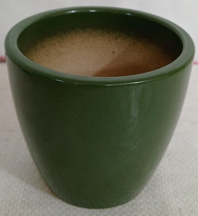 Small glossy ceramic pot