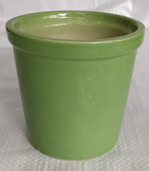 Sleek and minimalistic round rim ceramic plant pot