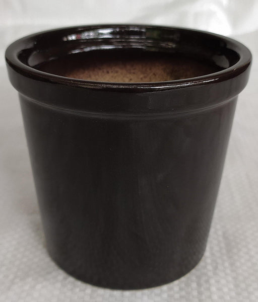 Minimalist round rim ceramic plant pot in shiny coffee color