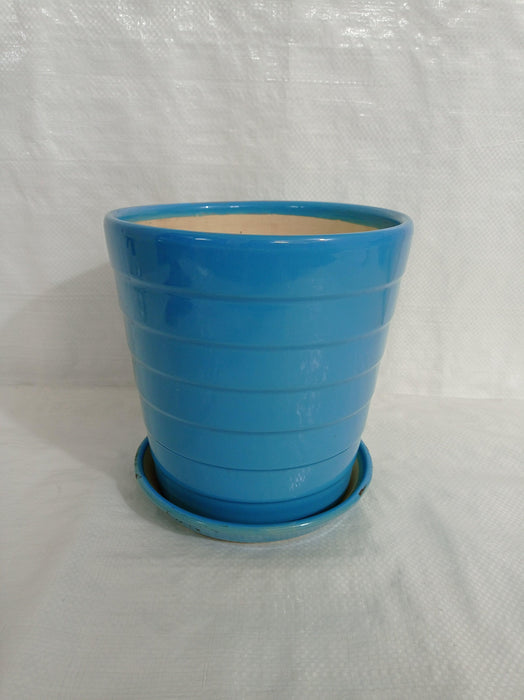 Large sky blue ceramic plant pot with round design