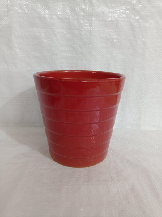 Ceramic plant pot with convenient drainage system