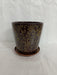 Large round ceramic pot with fancy brown design