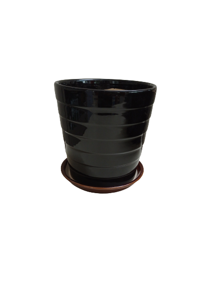Large black ceramic pot with drainage hole