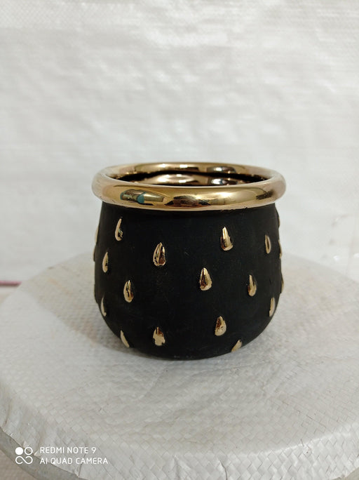 Contemporary round ceramic planter bowl in black and gold multicolor