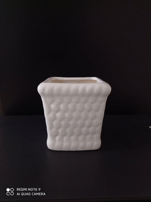 White ceramic honeycomb design plant pot