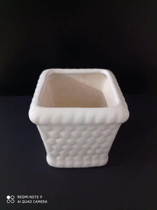 Contemporary indoor plant pot with drainage hole