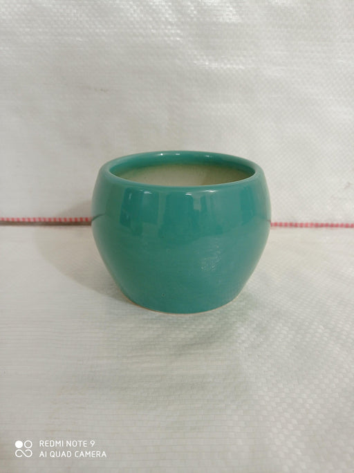 Creative round turquoise ceramic plant pot for home decor
