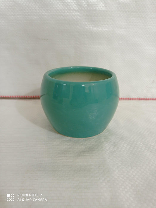Creative round turquoise ceramic plant pot for home decor