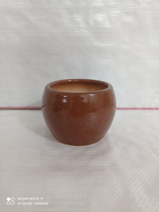 Brown ceramic plant pot