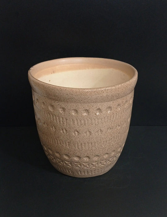 Carving Design on Brownish Ceramic Pot