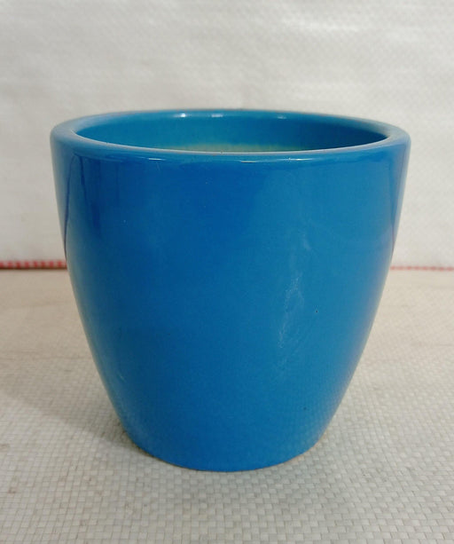 Ceramic plant pot with modern V-shape design