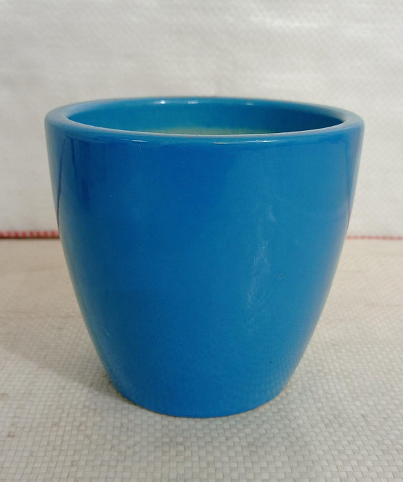 Ceramic plant pot with modern V-shape design