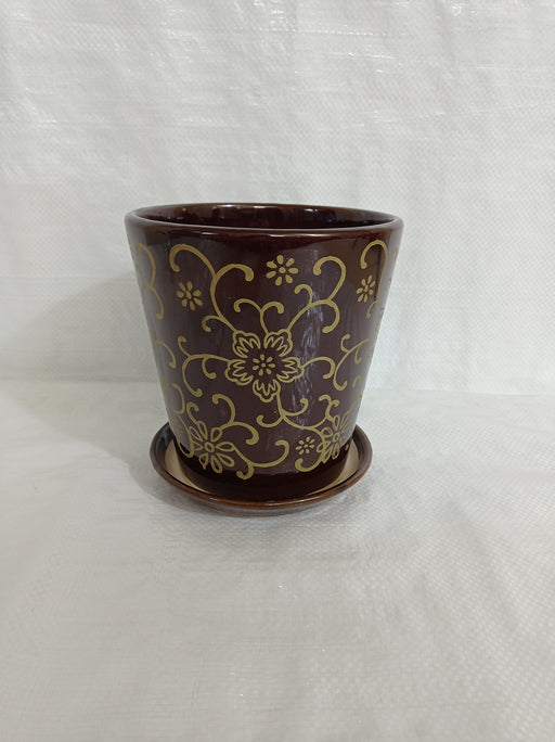 Medium round ceramic pot with fancy artful design