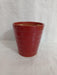 Elegant and functional red ceramic plant pot with drainage hole