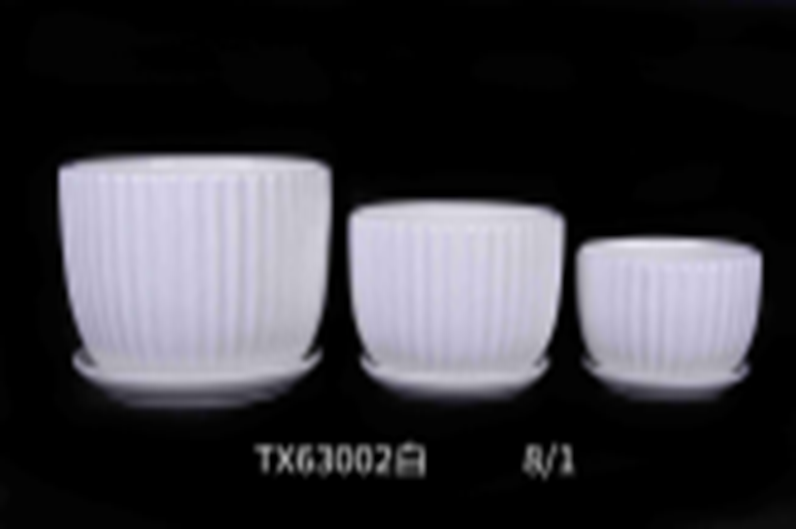Striped white ceramic pot