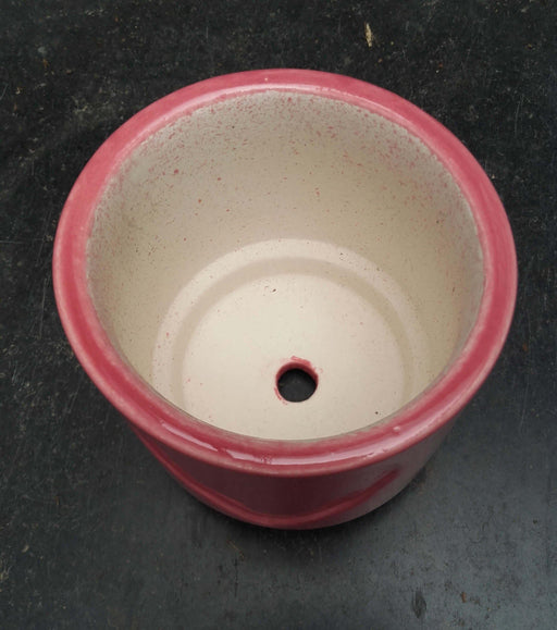 Red ceramic planter for indoor plants