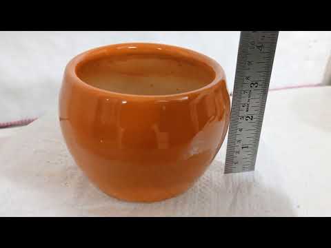 Stylish Ceramic Pot with Handi Design
